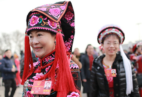 Ethnic minority representatives attend first session of 13th NPC