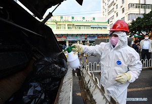 Pic story of sanitation worker in Hainan amid novel coronavirus outbreak