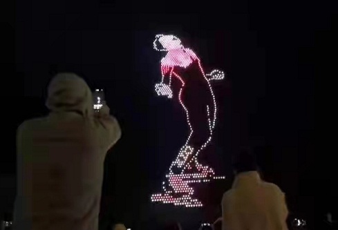 Hainan puts on drone light show to honor Chinese athletes