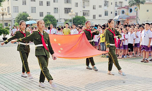 Luocheng holds flag-raising ceremony for Children’s Day