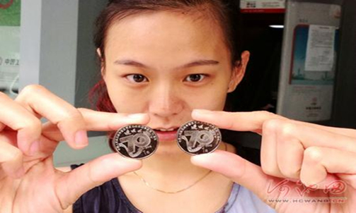 Commemorative coins for 70th anniversary of War of Resistance issued in Hechi