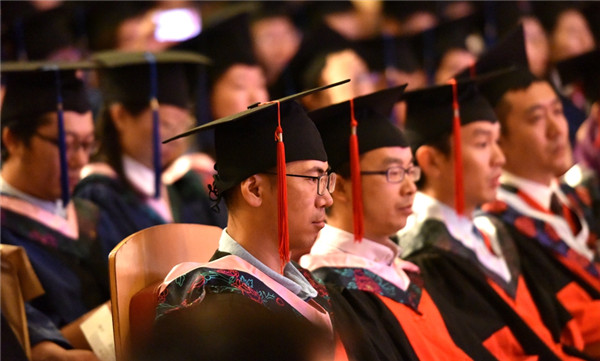 Graduates attend the ceremony held at Saihan campus of IMNU, July 3..jpg