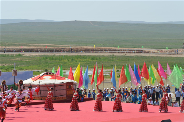 Dancers perform traditional Mongolian dancing at the opening ceremony of the 24th Tourism Naadam Festival
