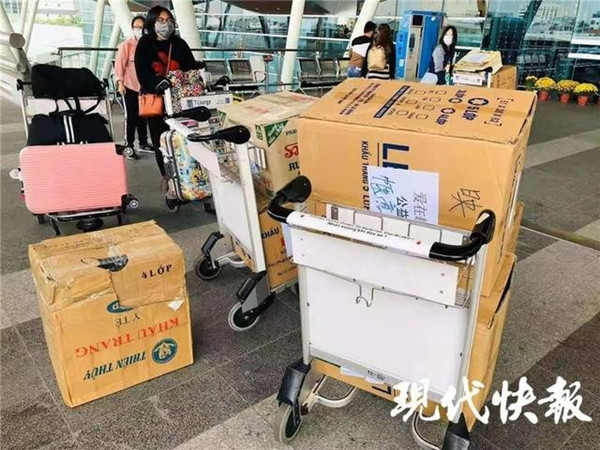 Surgical masks collected through a campaign by Nguyen Thi Lien and her friends in Vietnam are transported to Wuhan, Hubei province, the center of the novel coronavirus outbreak.jpg