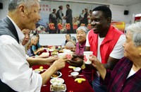 Intl students send best wishes to senior citizens