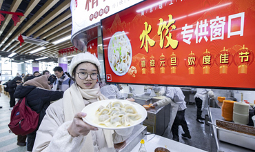 School offers free dumplings to welcome New Year