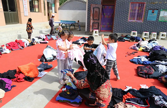 Jinchuan Group holds charity event at Magou village