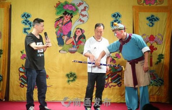 Renowned Peking Opera actor gives lecture in Chongchuan 