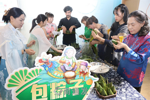 Cultural exchange event celebrates Dragon Boat Festival in Chongchuan