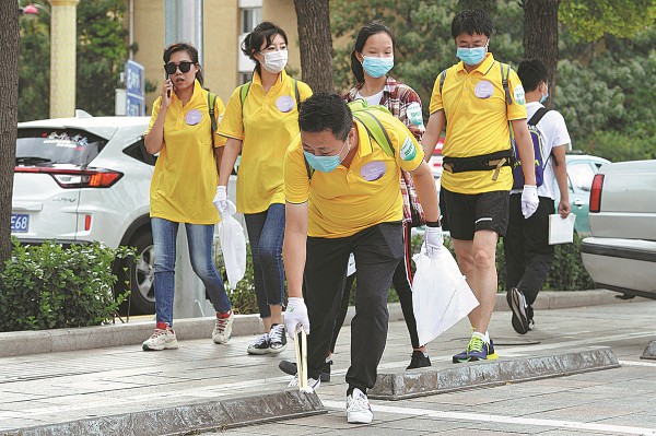 'Plogging' helps Yinchuan youngsters keep selves, environment in shape