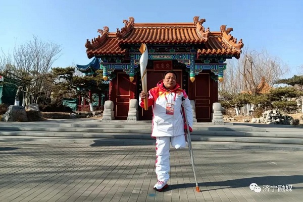 Jining village secretary serves as Paralympics torch bearer
