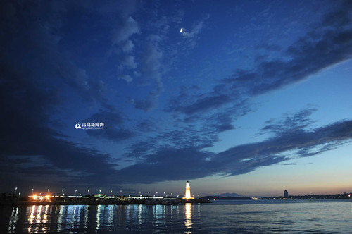 China's sailing city lights up at night