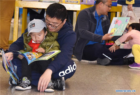 Family reading promoted to greet World Book Day in Qingdao