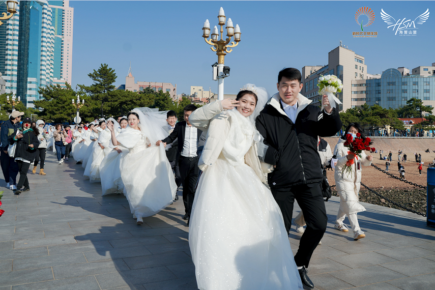 Group wedding celebration held to celebrate love and promote civilized living