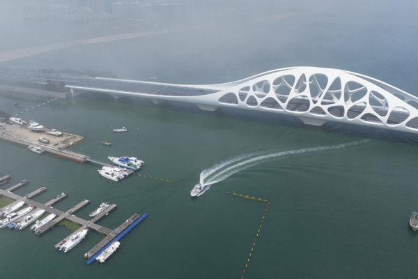 Clouds float over Shanhubei Bridge in Qingdao West Coast New Area