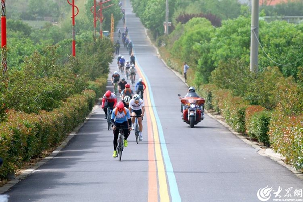 Qingdao WCNA hosts cycling event to celebrate Intl Tea Day