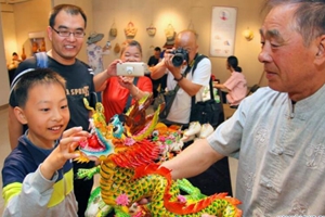 Intangible cultural heritage exhibition held in Yantai
