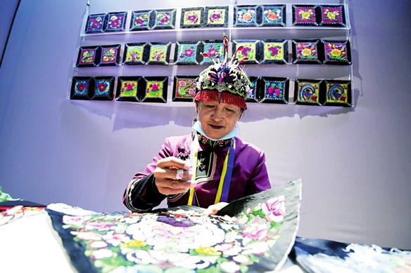 Traditional embroidery helps embellish villagers' lives