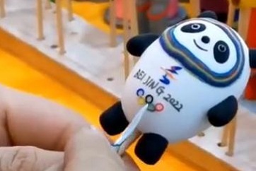 Jining craftsman handmakes Winter Olympics mascot out of dough