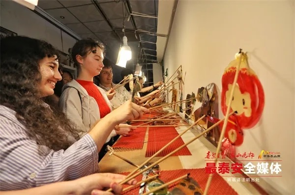 French youth gain insights into Taishan Shadow Puppetry