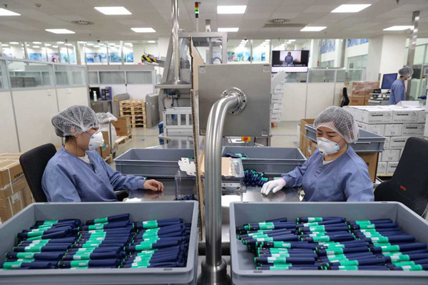 Employees work on the production line of a Novo Nordisk venture in Tianjin. [Provided to China Daily].jpg