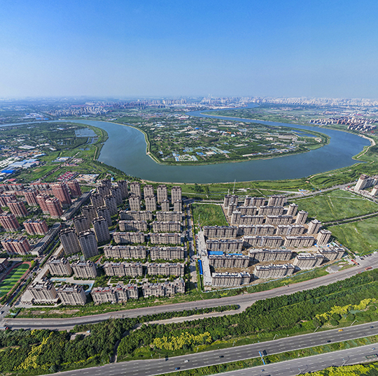 20新城镇图1-依傍海河绵延发展，把绿色生态还给百姓 - 副本.jpg