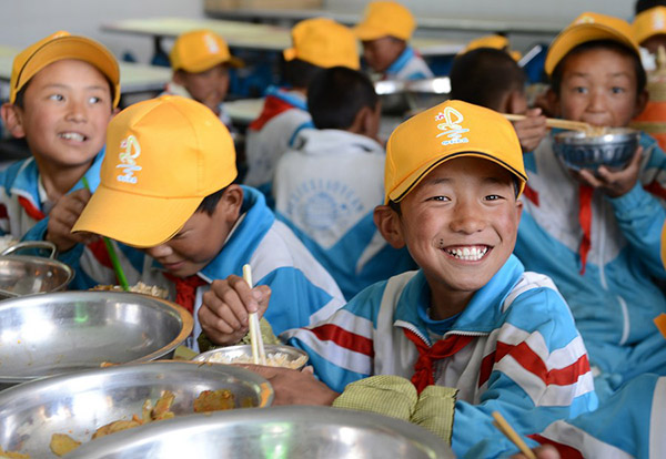Students in Tibet, south Xinjiang enjoy free education for 15 years: White paper