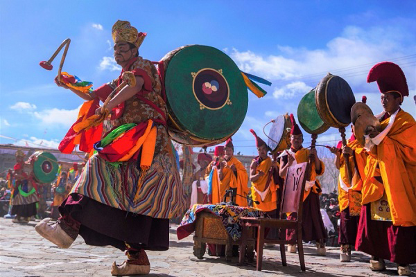 Tibetan Buddhist monks perform during Cham dance ritual