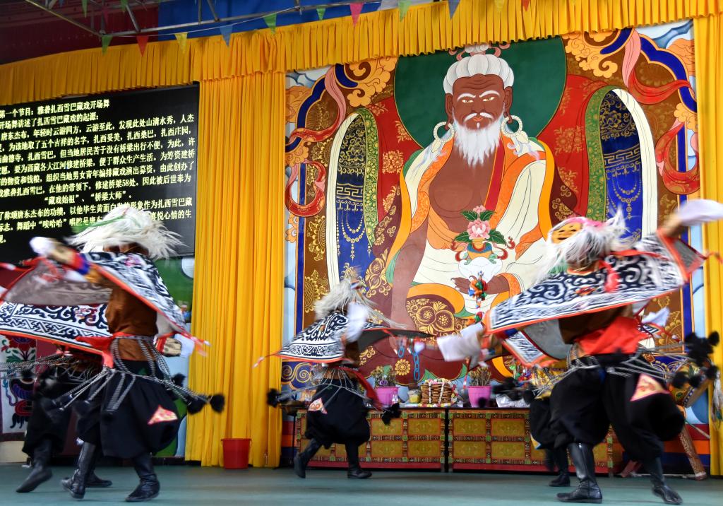 Tibetan villagers attract tourists with opera shows
