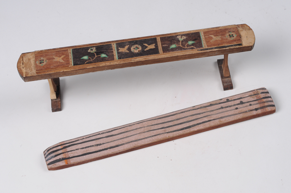 Guqin model unearthed in Turpan's Astana Cemetery