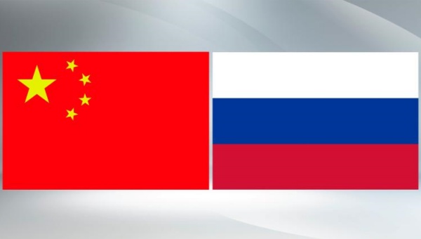 Xi, Putin exchange New Year greetings