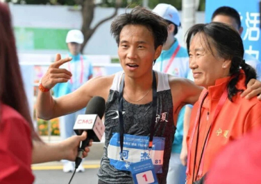 He Jie from Ningxia clinches gold in men's marathon at National Games