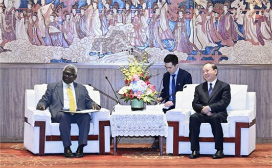 Huang Kunming meets with PM of the Solomon Islands