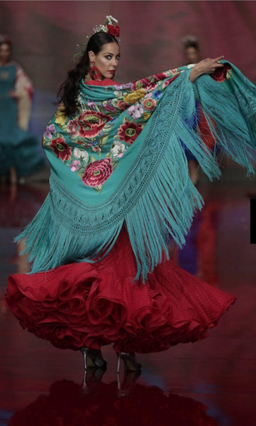 A model displays a manila shawl with Canton embroidery.png