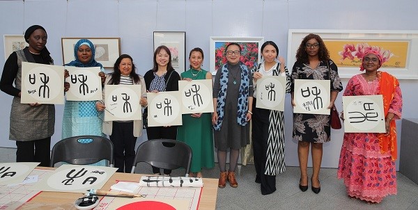 Guests display their calligraphy works.jpg