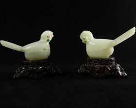 A pair of white jade boxes with bird design