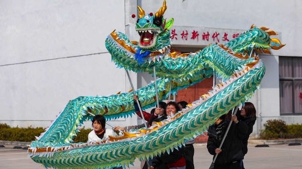 Dragon dance tradition thrives in Jiulonghu