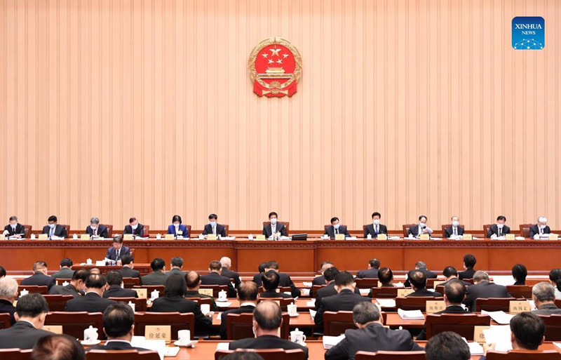 Chinese lawmakers meet to review multiple reports.jpg