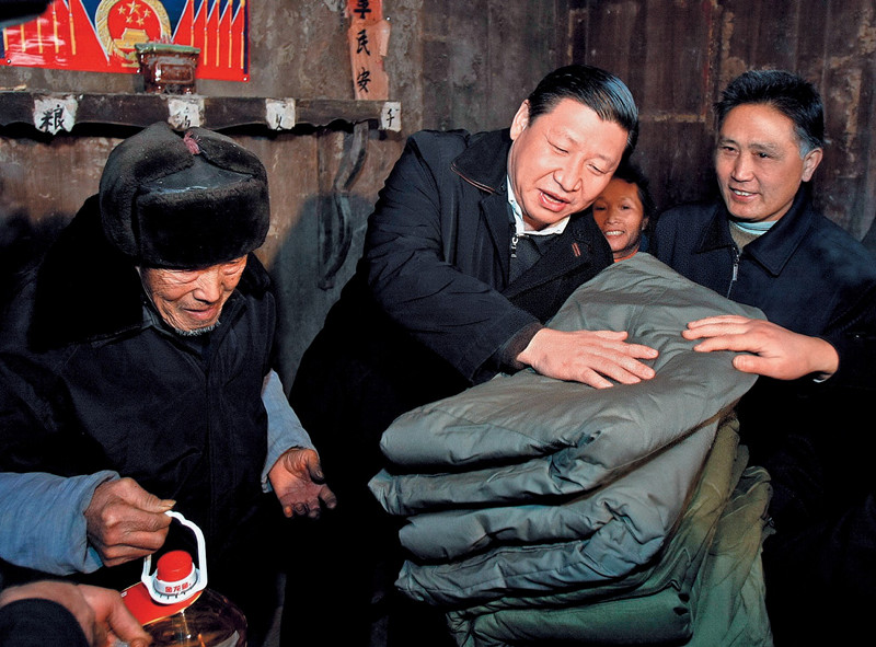 Visiting Tang Zhaowei and his family, who suffered a loss in a catastrophic snowstorm which hit the Dong ethnic people villages in Tongren Prefecture, Guizhou Province, January 2008..jpg