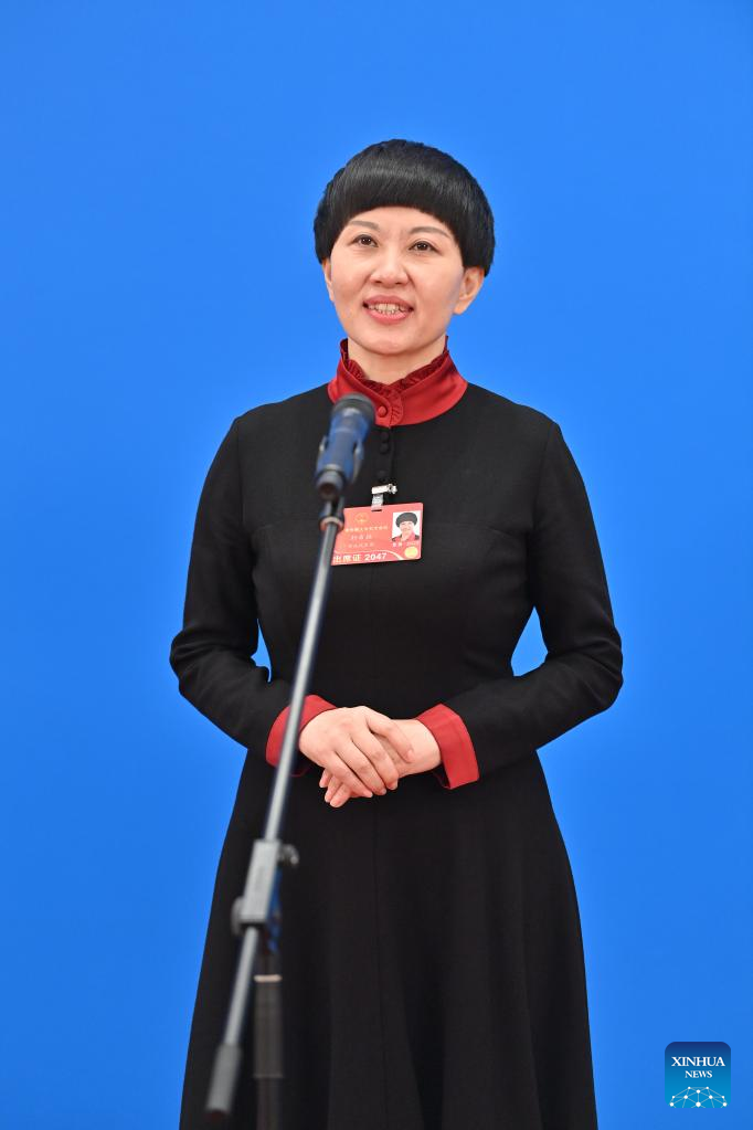 NPC deputy from Chongqing makes suggestions about education2.jpg
