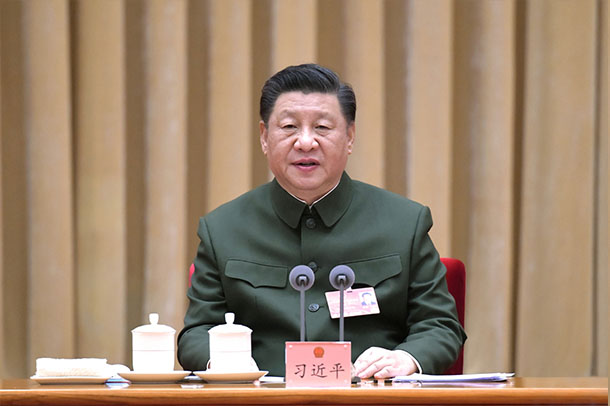 Xi stresses running military in accordance with law