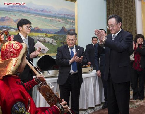 Wu Bangguo (R), chairman of the Standing Committee of the National People's Congress of China, attends a welcoming banquet by Zandaakhuu Enkhbold, chairman of the Mongolian State Great Hural (parliament), in Ulan Bator, Mongolia, Jan. 30, 2013. (Xinhua/Wang Ye) 