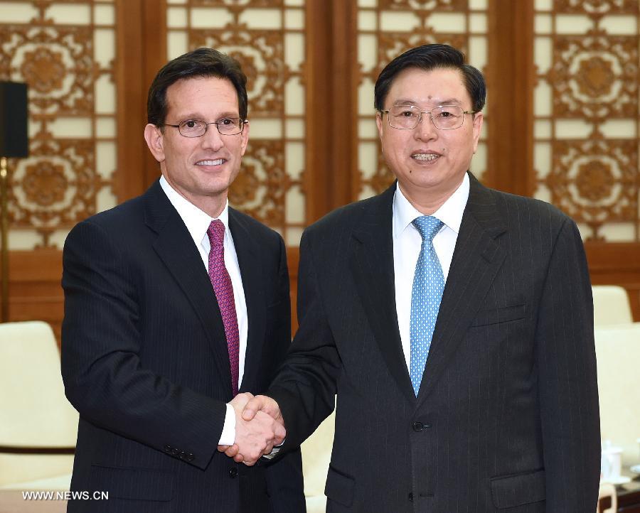 Zhang Dejiang (R), chairman of China's 12th National People's Congress (NPC) Standing Committee, meets with the U.S. House Majority Leader Eric Cantor in Beijing, capital of China, April 24, 2014. (Xinhua/Ma Zhancheng)