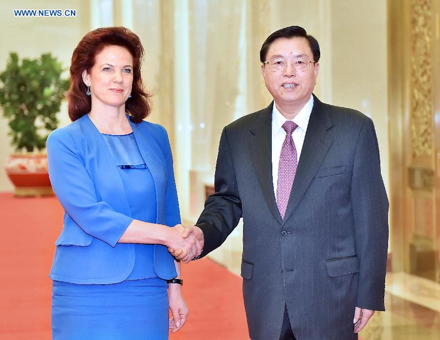 Zhang Dejiang (R), chairman of China's National People's Congress (NPC) Standing Committee, holds talks with Solvita Aboltina, chairperson of the Parliament of Latvia, in Beijing, capital of China, May 27, 2014. (Xinhua/Li Tao) 