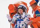 Crew members of the Shenzhou XIII mission return to Earth
