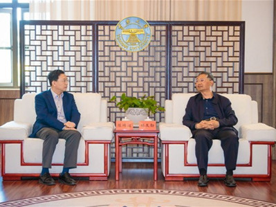 Yunnan University, Tus-Holdings deepen their cooperation